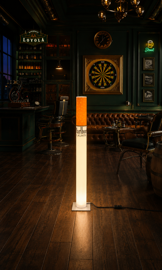 Dark green British pub style home bar with darts and warm lighting