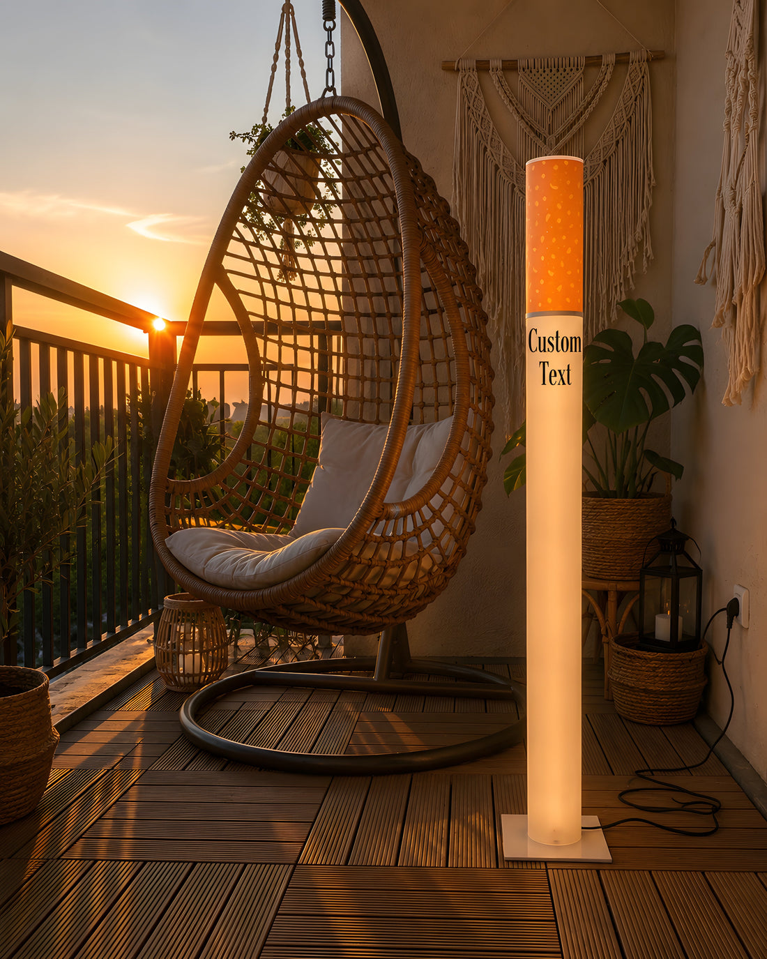 Personalized giant cigarette lamp glowing on a balcony at sunset