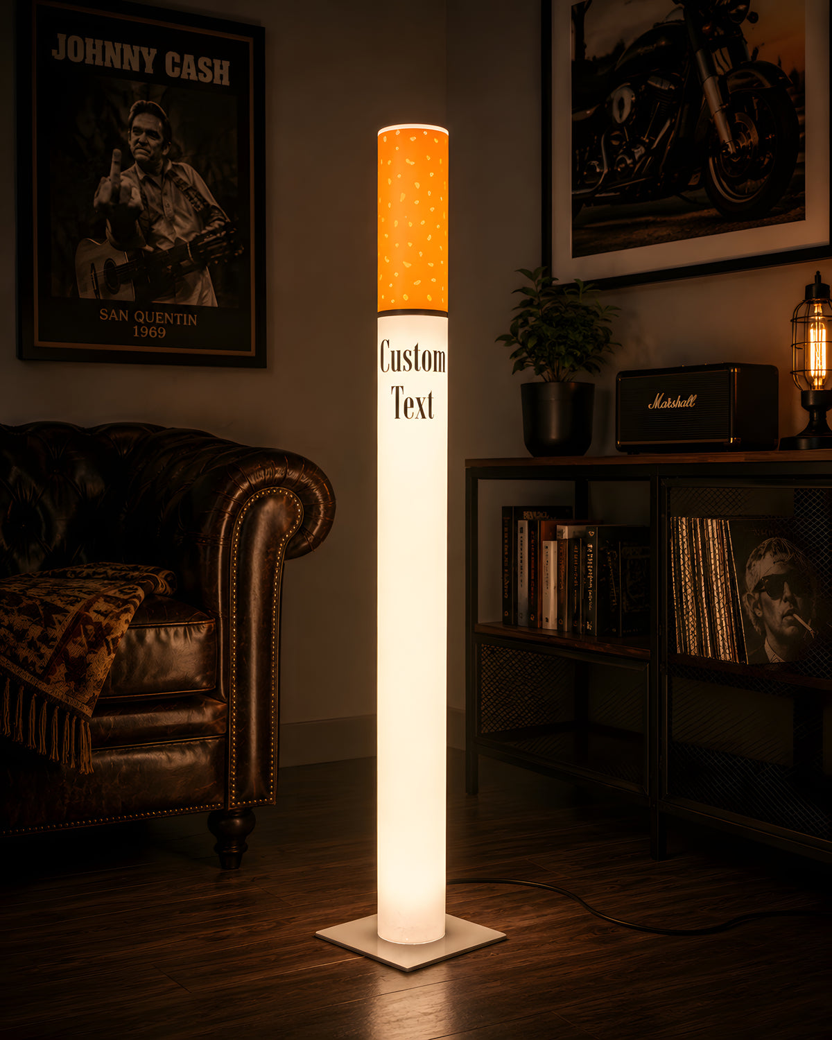 Marlboro Lamp giant cigarette lamp lighting a music room with a chesterfield sofa, vinyl record shelf, guitar amp and rock posters